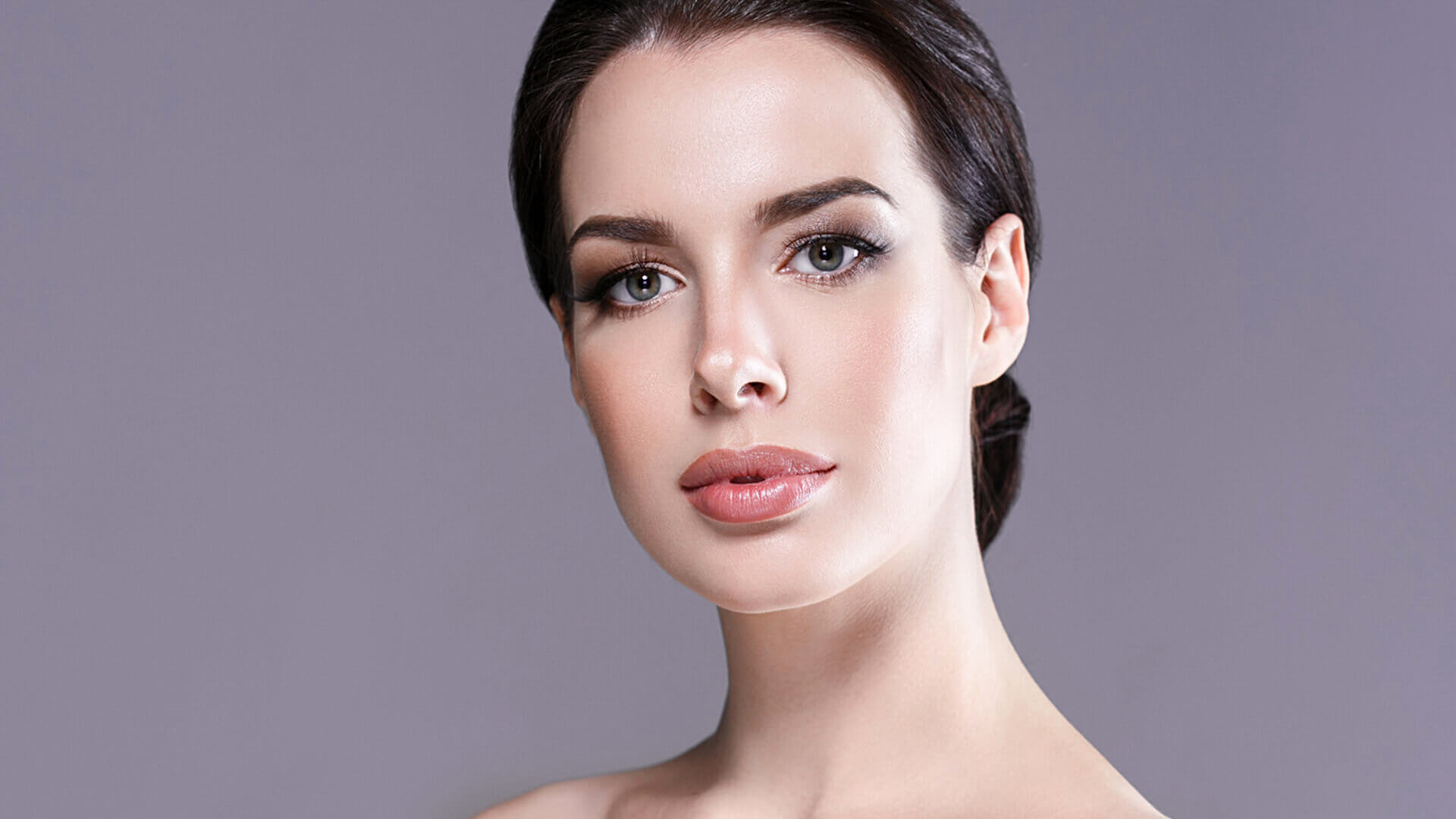 Bridal Makeup Service - Professional makeup artist applying finishing touches